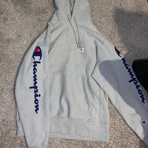Gray champion hoodie in a size medium